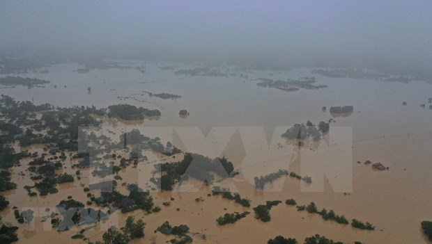 Record flooding kills 84 in central region so far Flooding drowns Dong Ha city of Quang Tri (Photo: VNA)