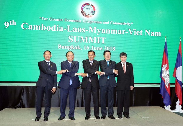 Tổng thống Myanmar Win Myint, Thủ tướng Nguyễn Xuân Phúc, Thủ tướng Campuchia Samdech Techo Hun Sen, Thủ tướng Lào Thongloun Sisoulith và Tổng thư ký ASEAN Lim Jock Hoi chụp ảnh chung tại Lễ khai mạc hội nghị CLMV. (Ảnh: Thống Nhất/TTXVN)