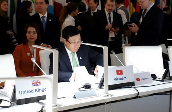 Deputy Prime Minister and Foreign Minister Pham Binh Minh attends the14th ASEM Foreign Ministers' Meeting (Photo: VNA)