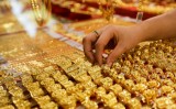 Giá vàng thế giới bật tăng nhưng vẫn thấp hơn vàng SJC khoảng 7,56 triệu đồng/lượng