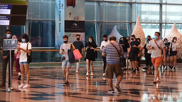 Southeast Asian countries tighten COVID-19 prevention measures People wearing face masks at Changi Airport Terminal 3. (Source: channelnewsasia.com)