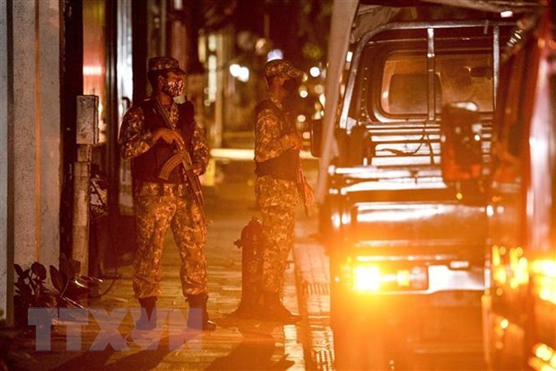 Maldives soldiers guard at Male capital on May 6 (Photo: AFP/VNA)