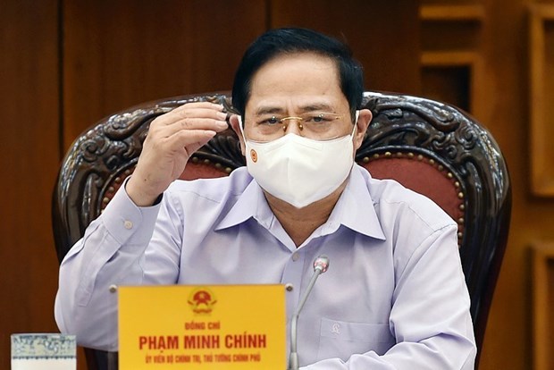 Absolute safety ensured for upcoming general elections Prime Minister Pham Minh Chinh chairs a meeting of permanent Cabinet members on election organisation amid COVID-19. (Photo: VNA)