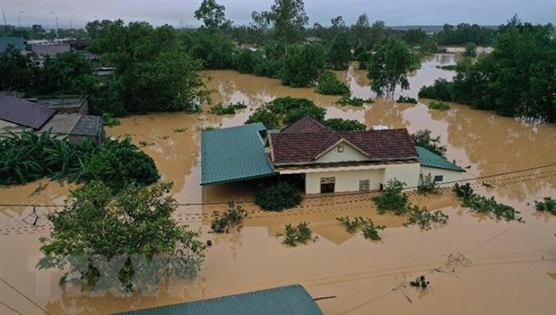 Xây dựng kế hoạch phòng, chống thiên tai trong bối cảnh dịch COVID-19 Lũ lớn trên sông Hiếu gây ngập diện rộng tại khu vực xã Thanh An, huyện Cam Lộ, tỉnh Quảng Trị năm 2020. (Ảnh: Hồ Cầu/TTXVN)