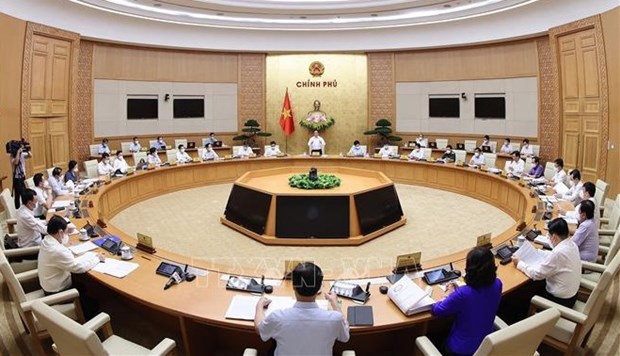 Government proposes sustaining structure of ministries, ministerial-level agencies At the regular Government meeting in June 2021 (Source: VNA)