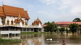Storm Dianmu submerges temples in Thai city Storm Dianmu submerges temples in Thai city