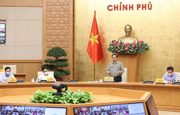 PM asks for safely adapting to pandemic PM Pham Minh Chinh at the event (Photo: VNA)