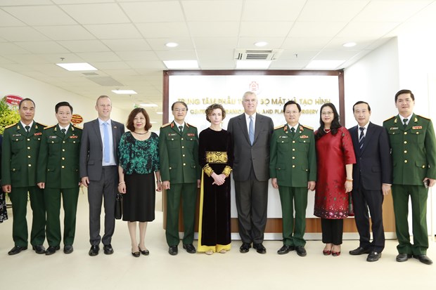 Helping facial-different children face the world with a smile Katrin Kandel, CEO of Facing the World, (sixth from left), Britain's Prince Andrew, Duke of York (fifth from right), and Mai Hong Bang, director of 108 Military Central Hospital (fourth from right) at the inauguration of the Centre for Craniofacial and Plastic Surgery in 2018. (Photo courtesy of 108 Military Central Hospital)
