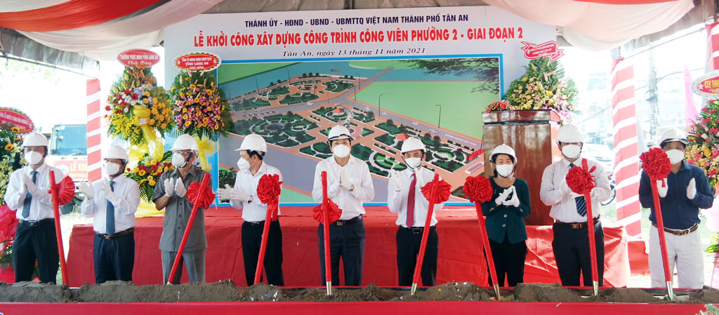 Delegates perform the groundbreaking ceremony