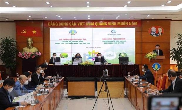 Vietnam eyes green and sustainable agriculture At the dialogue (Photo: VNA) The strategy is designed around three pillars: “ecological agriculture”, “modern countryside”, and “smart farmers”. The minister underlined the necessity for the sector to have a far-sighted vision and bold actions in order to speed up green and sustainable agricultural transformation, saying that changes in agricultural development model are needed for ensuring sustainability, competitiveness and resilience in the face of challenges. Minister Hoan stressed that with new thinking, Vietnam can aspire to become a country of ecological and carbon-neutral agriculture instead of just a food production powerhouse. However, in order to make breakthrough changes, the agricultural industry cannot do it alone. It needs companionship and support of relevant ministries, sectors and localities, as well as organizations and individuals at home and abroad, he said. WB Country Director for Vietnam Carolyn Turk said agriculture is one of the main contributors to climate change when it causes greenhouse gas emissions (GHG emissions). GHG emissions are forecast to reach 120 million tonnes of CO2 by 2030, up to half of which will come from the rice industry. Vietnam has made a strong commitment at COP26 to achieve net zero emissions by 2050, reduce methane emissions by 30 percent by 2030, she said, noting that this is a challenge for Vietnam's rice industry. WB will continue to cooperate, provide technical assistance, and expand investment activities with the MARD to help Vietnam move towards a brighter future for its agricultural sector, she affirmed. Martien Van Nieuwkoop, Global Director for the Agriculture and Food Global Practice in the WB's Sustainable Development Practice Group said that Vietnam needs to change public spending in agriculture, create appropriate incentive mechanisms, and re-evaluate public investment in agriculture. Attention should be paid to changing the structure of land ownership to solve the problem of small-scale production, which directly affects the development speed of the agricultural sector, he said, adding that it is necessary to have public-private partnerships to make proper investment decisions for agriculture./. VNA World BankEcological AgricultureModern CountrysideSmart FarmerAgricultural Development ModelEmissions ReductionSustainabilityDialogue