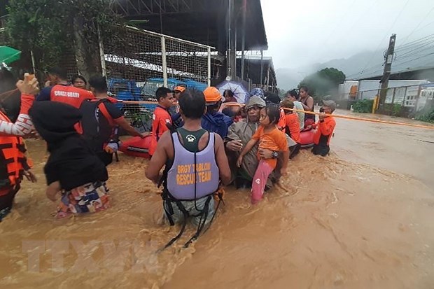 Mưa lớn do ảnh hưởng của bão nhiệt đới Rai gây ngập lụt nhiều khu vực tại Cagayan de Oro, phía nam đảo Mindanao, Philippines, ngày 16/12/2021. (Ảnh: AFP/TTXVN)