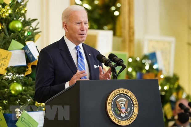 Top 10 international events in 2021 selected by VNA US President Joe Biden at the White House on December 16 (Photo: AFP/VNA)