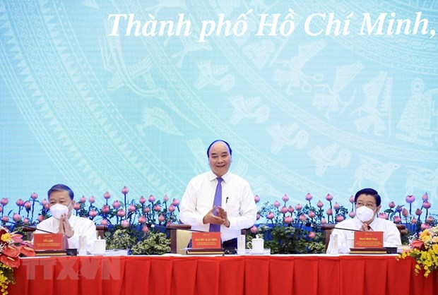 Chủ tịch nước Nguyễn Xuân Phúc chủ trì Hội thảo quốc gia lần thứ 3 về xây dựng và hoàn thiện Nhà nước pháp quyền xã hội chủ nghĩa. (Ảnh: Thống Nhất/TTXVN)
