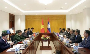 Vietnamese, Lao NA agencies foster collaboration