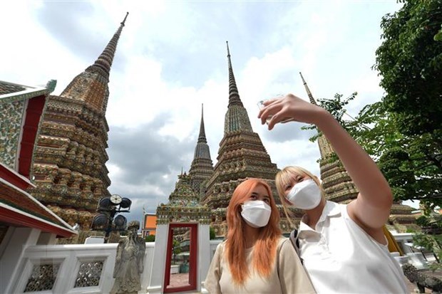 Tourists in Bangkok, Thailand (Photo: VNA)