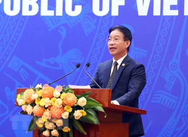 Phó Chủ nhiệm Văn phòng Chủ tịch nước Phạm Thanh Hà công bố Quyết định về đặc xá năm 2022 của Chủ tịch nước. (Ảnh: Phạm Kiên/TTXVN)