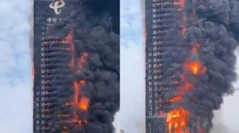 Cháy tòa nhà cao tầng ở thành phố miền nam Trung Quốc