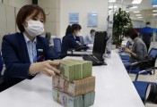 Vay vốn ngân hàng bị 'ép' mua bảo hiểm