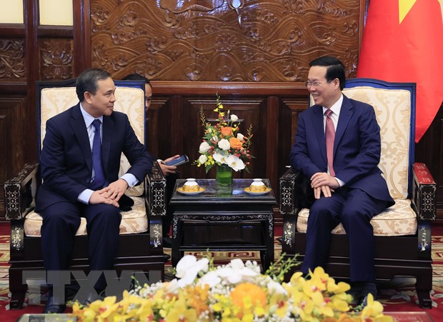 Chủ tịch nước mong muốn Đại sứ tiếp tục đóng góp nhiều hơn nữa vào sự phát triển tốt đẹp của tình hữu nghị và quan hệ đặc biệt giữa hai nước Việt Nam-Lào. (Ảnh: Thống Nhất/TTXVN)
