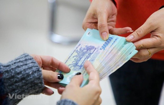 Bộ trưởng Nội vụ nêu 5 giải pháp thực hiện cải cách tiền lương Ảnh minh họa. (Nguồn: Vietnam+)