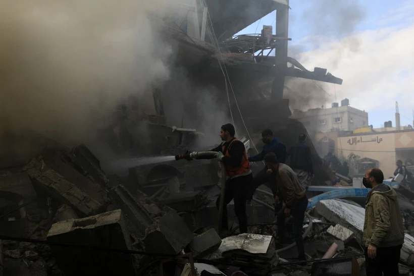 Cảnh đổ nát sau vụ oanh tạc của Israel xuống Dải Gaza ngày 14/12. (Nguồn: THX/TTXVN)