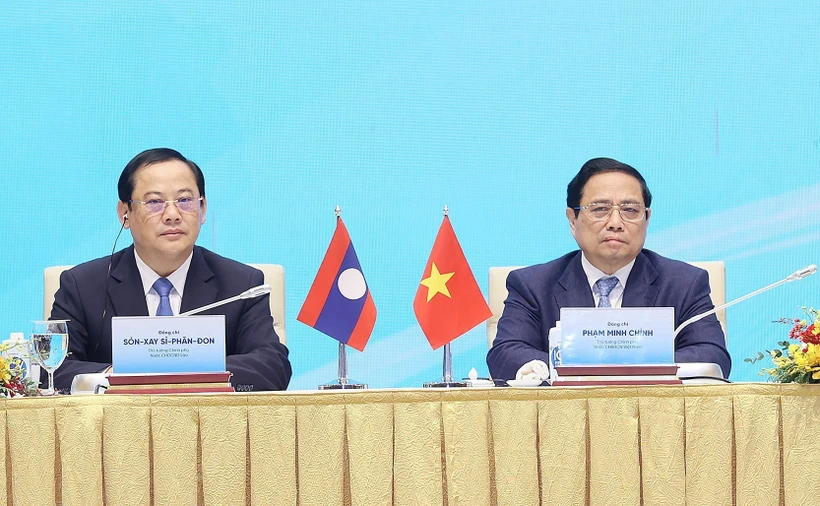 Thủ tướng Phạm Minh Chính và Thủ tướng Lào Sonexay Siphandone dự Hội nghị hợp tác đầu tư Việt Nam-Lào 2024. (Ảnh: Dương Giang/TTXVN)