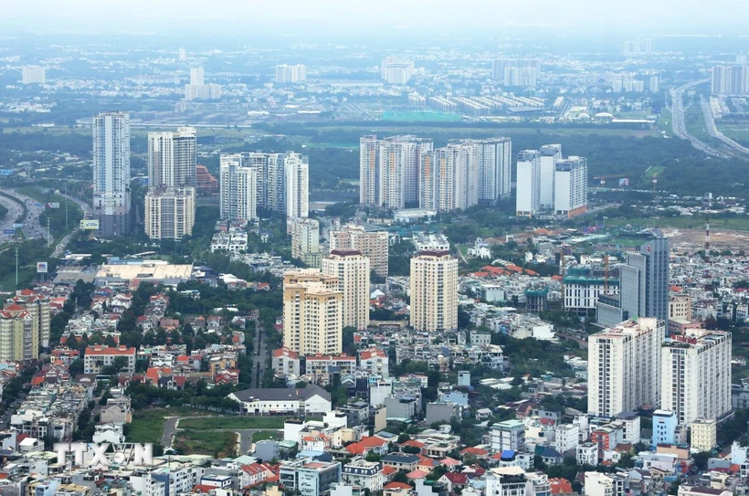 Thông qua Nghị quyết nâng cao hiệu quả thực hiện pháp luật quản lý bất động sản (Ảnh: Hồng Đạt/TTXVN)