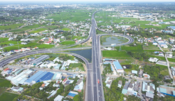 Building a synchronous transport system to create momentum for economic development